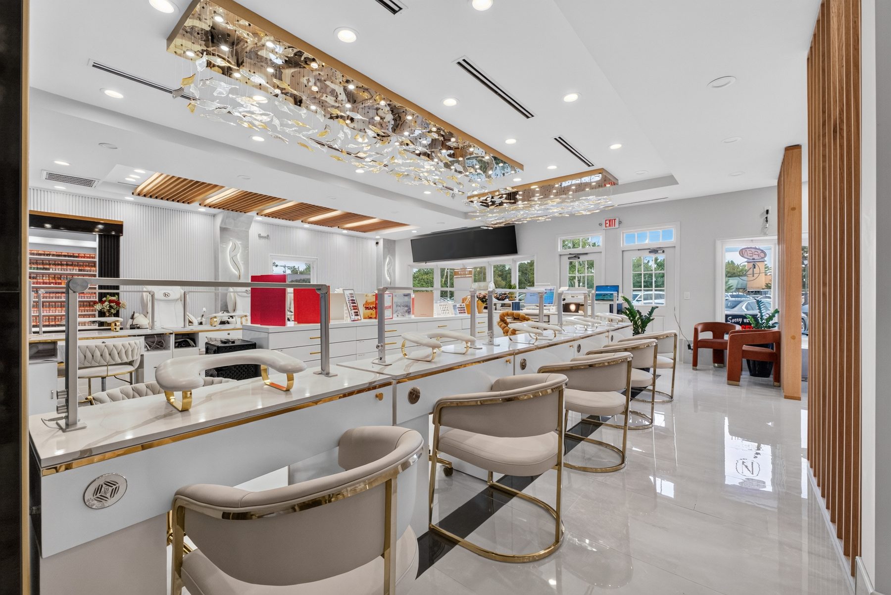 Manicure stations finished in white and brushed gold