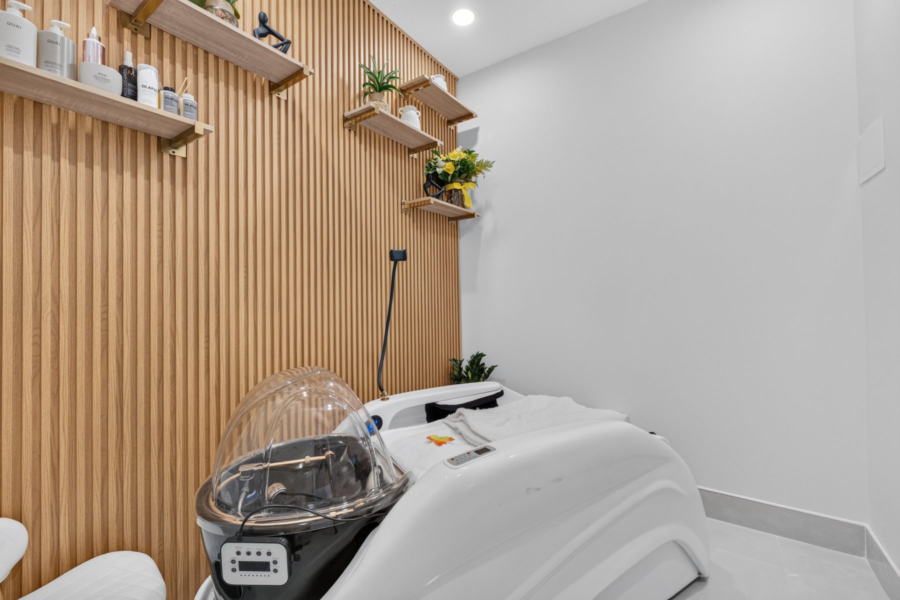 The spa suite with its warm wood-slat wall